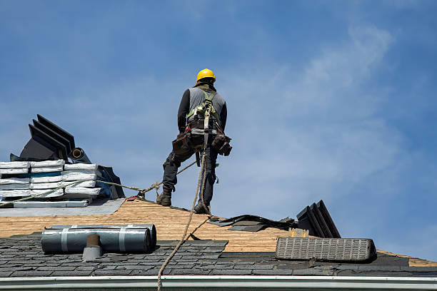 Professional Storm Damage Roof Repair technician working in Justice, OK